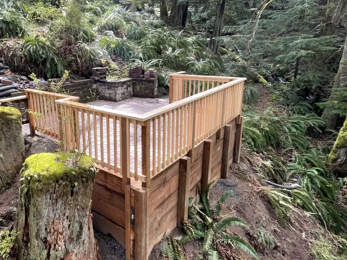 Cedar deck built into a forested property
