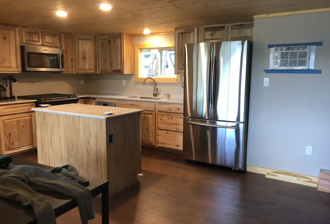 Custom cabin kitchen remodel with wood cabinetry